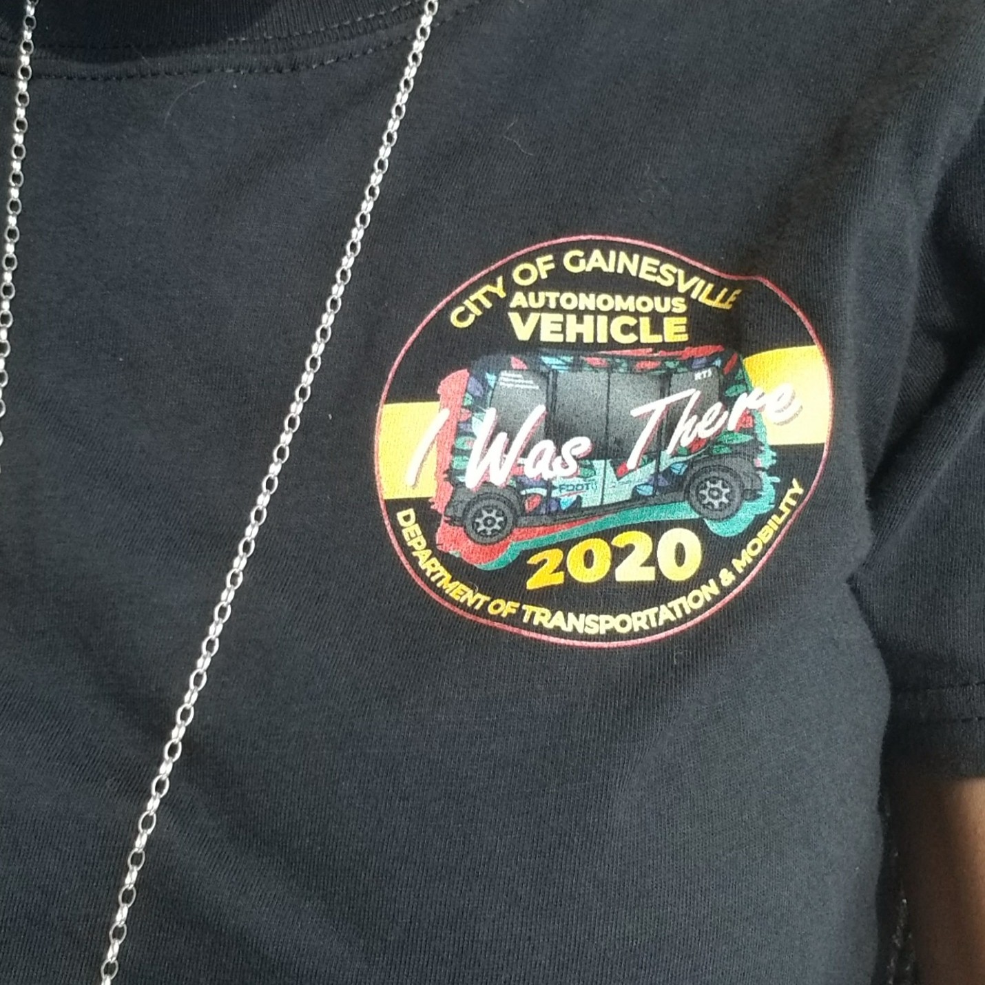 Autonomous vehicle open house event logo on tshirt